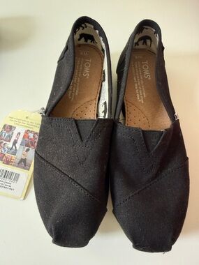 Toms Black Canvas Women's Slip-On Shoes
